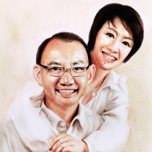 Commissioned portrait of a loving couple. Colored pastel drawing.