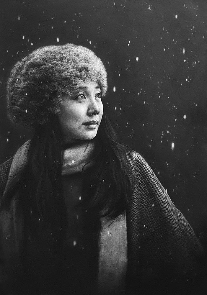 Wing - hyper-realistic portrait of a beautiful asian girl in the snow. Charcoal drawing.